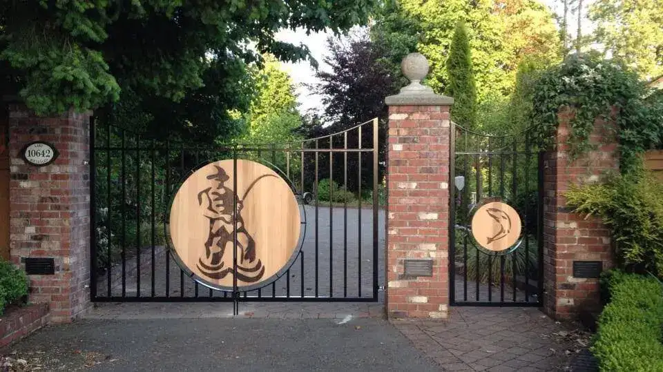 Garden gate with carved medallions