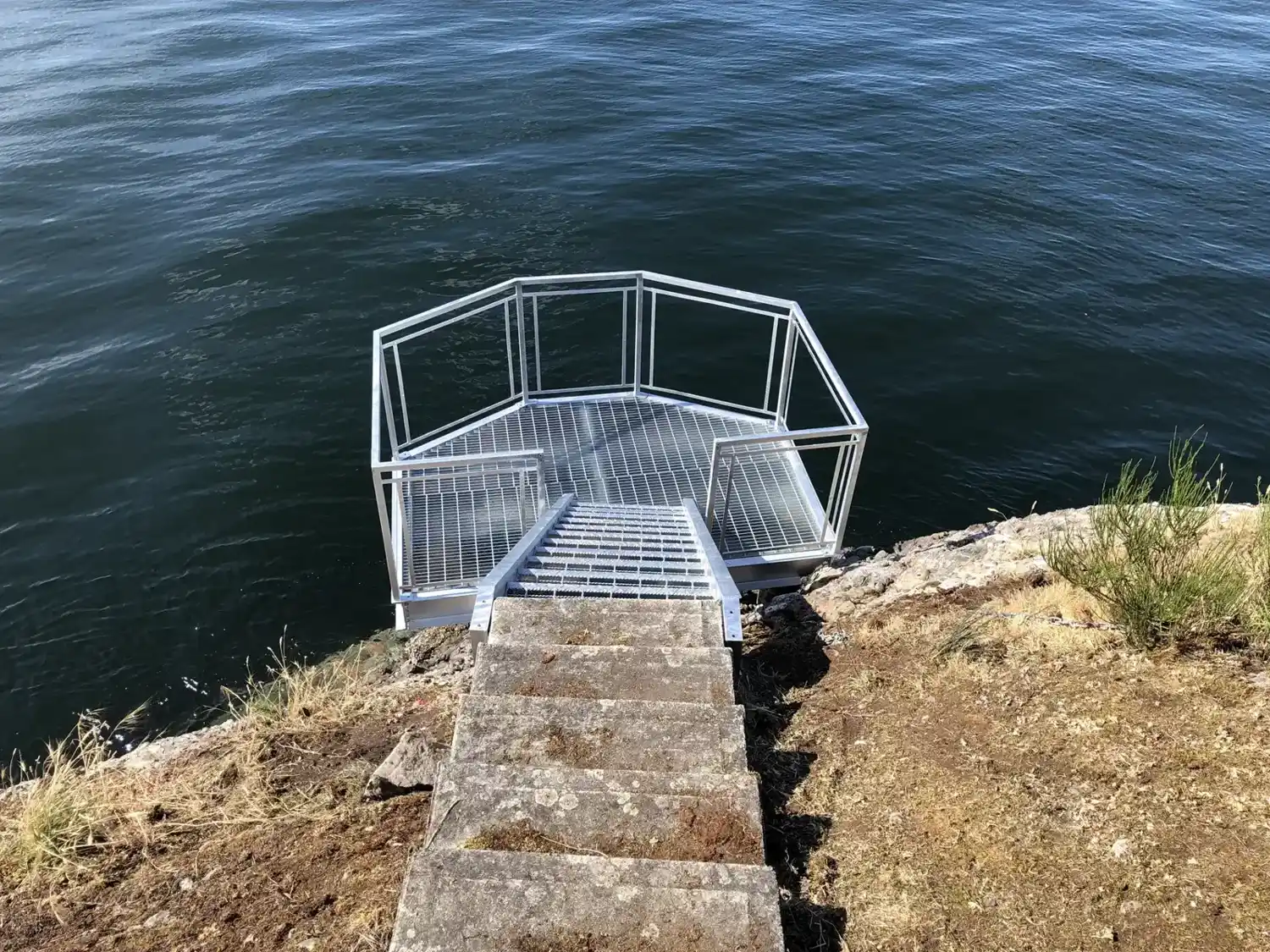 Aluminum observation platform cantilevered over the ocean